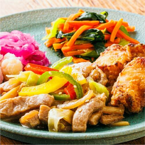 町中華の青椒肉絲と鶏ムネ唐揚げの相盛り